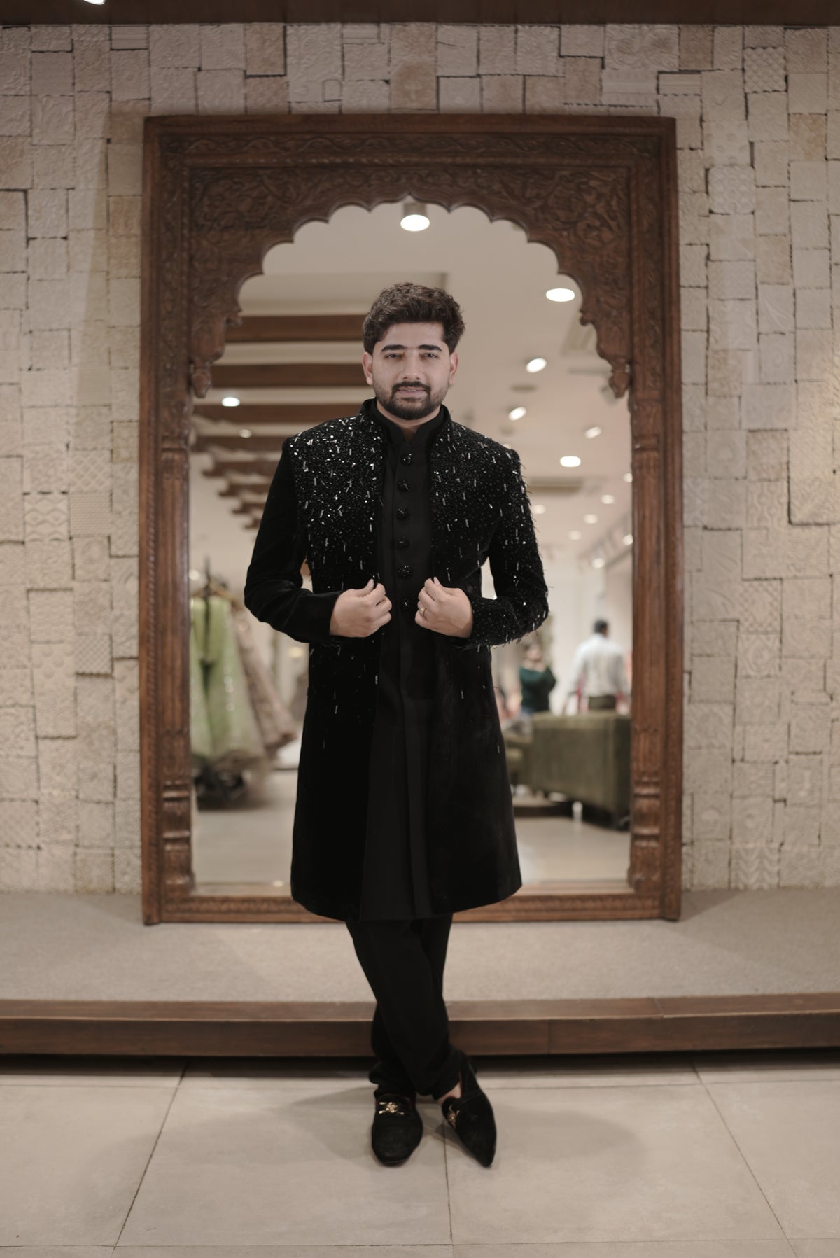 Black velvet indo-western sherwani with sequin embellishments