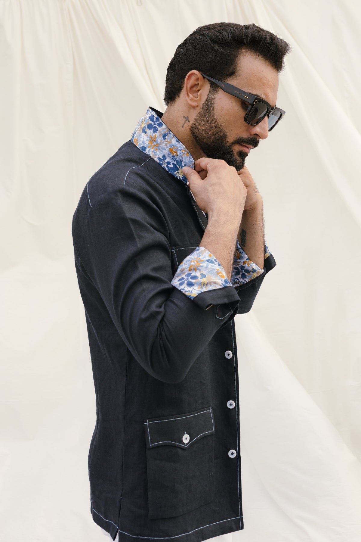 Black safari shirt with white contrast stitch and floral detail