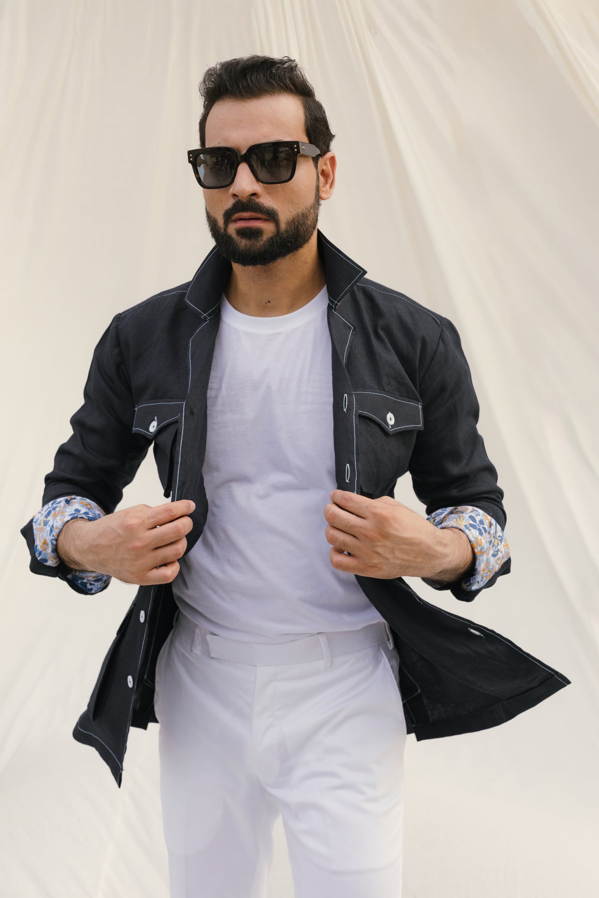 Black safari shirt with white contrast stitch and floral detail