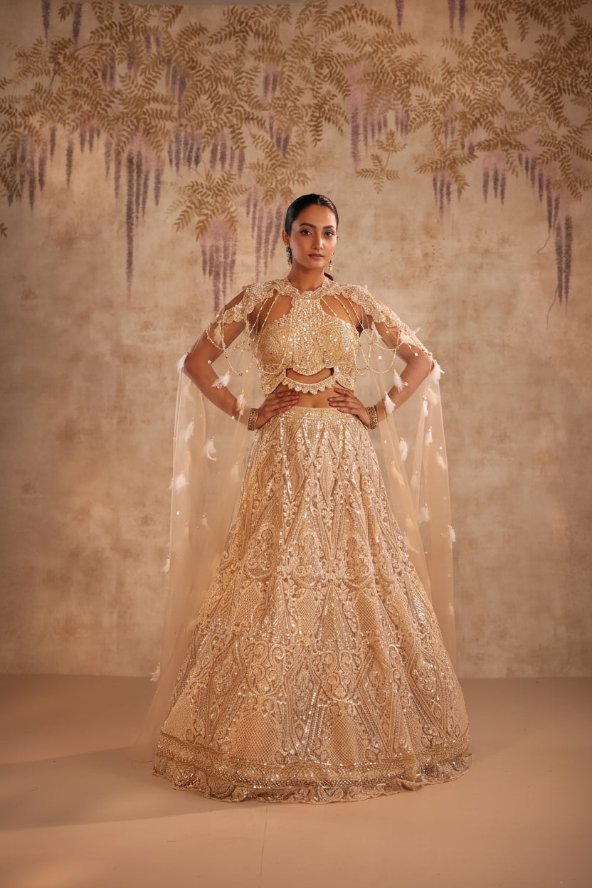 Cream Lehenga with Choker Style Cape and Embroidery