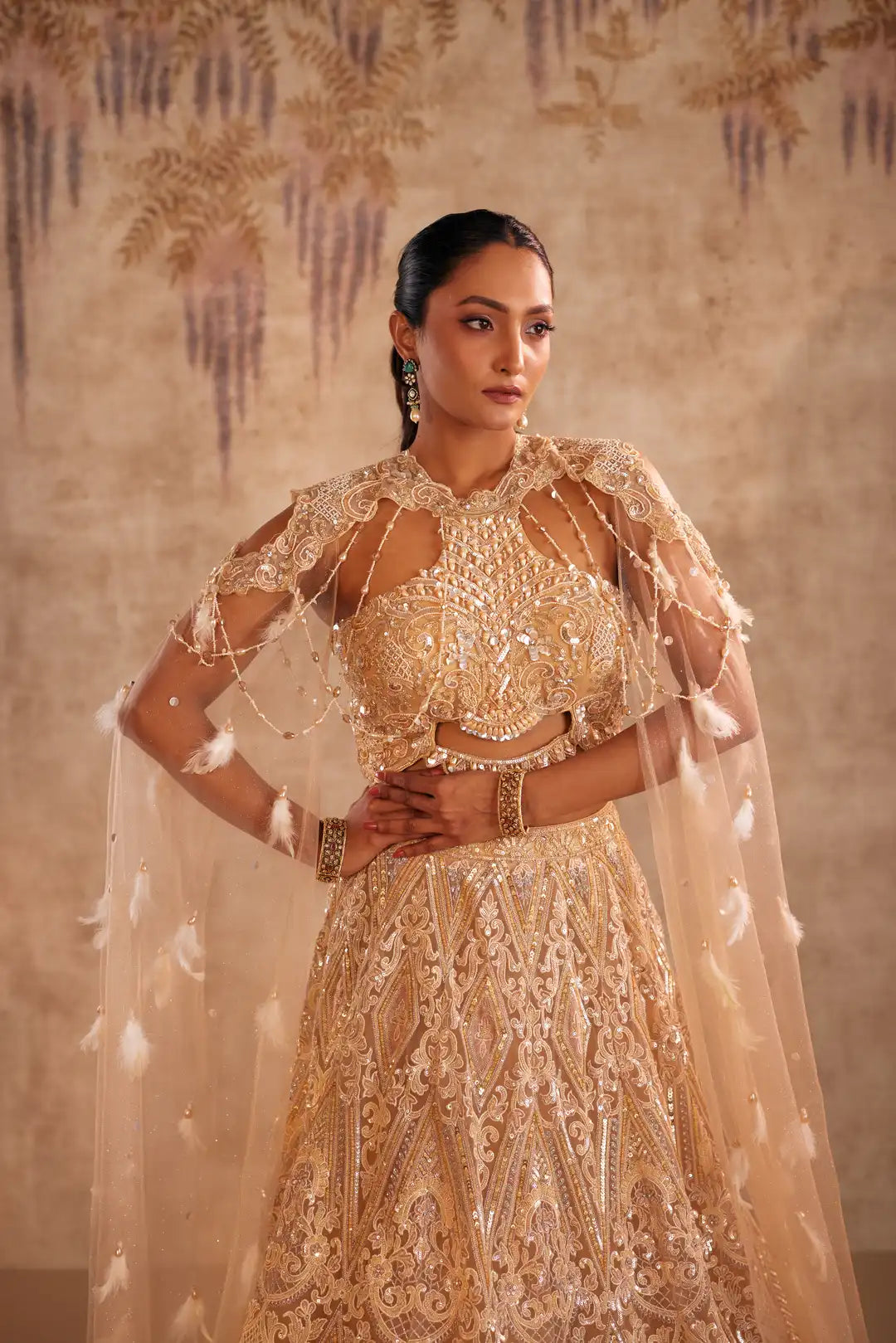 Cream Lehenga with Choker Style Cape and Embroidery