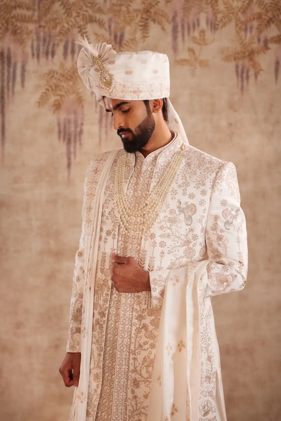 Off white silk Sherwani with pastel floral embroidery
