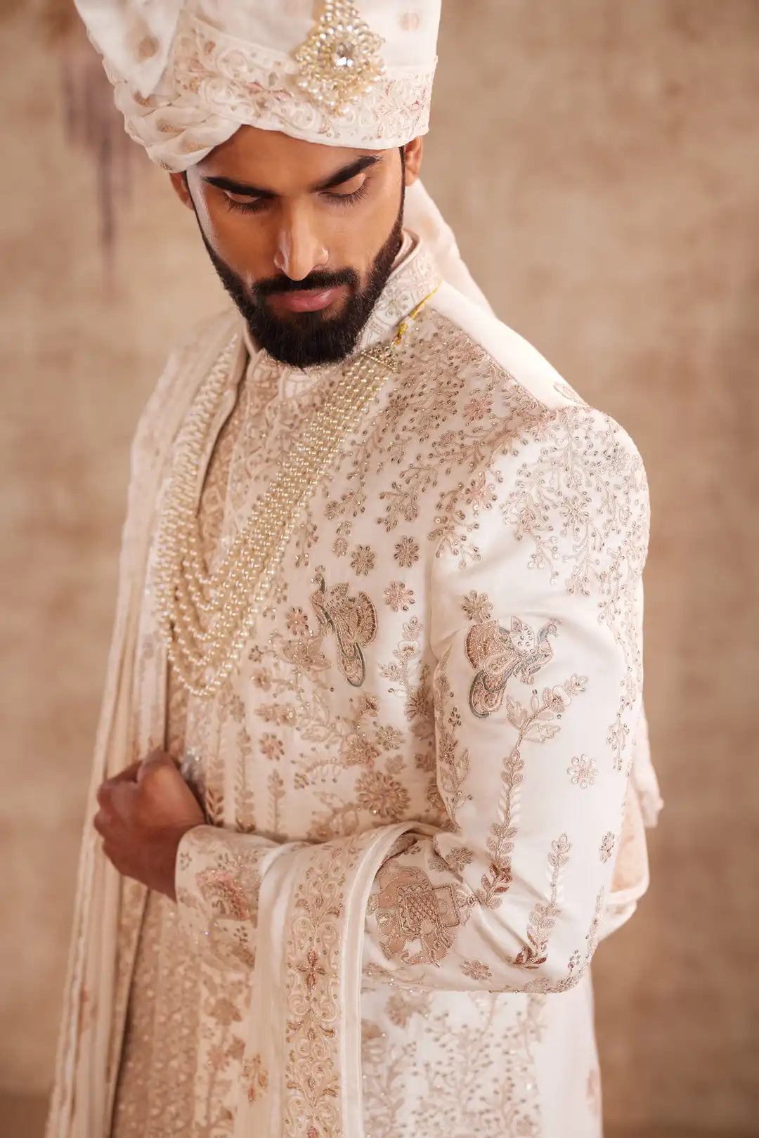 Off white silk Sherwani with pastel floral embroidery