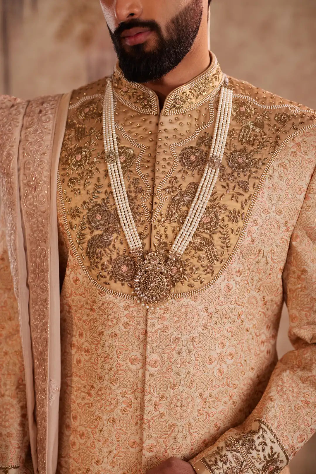 Gold silk Sherwani for groom with intricate hand embroidery