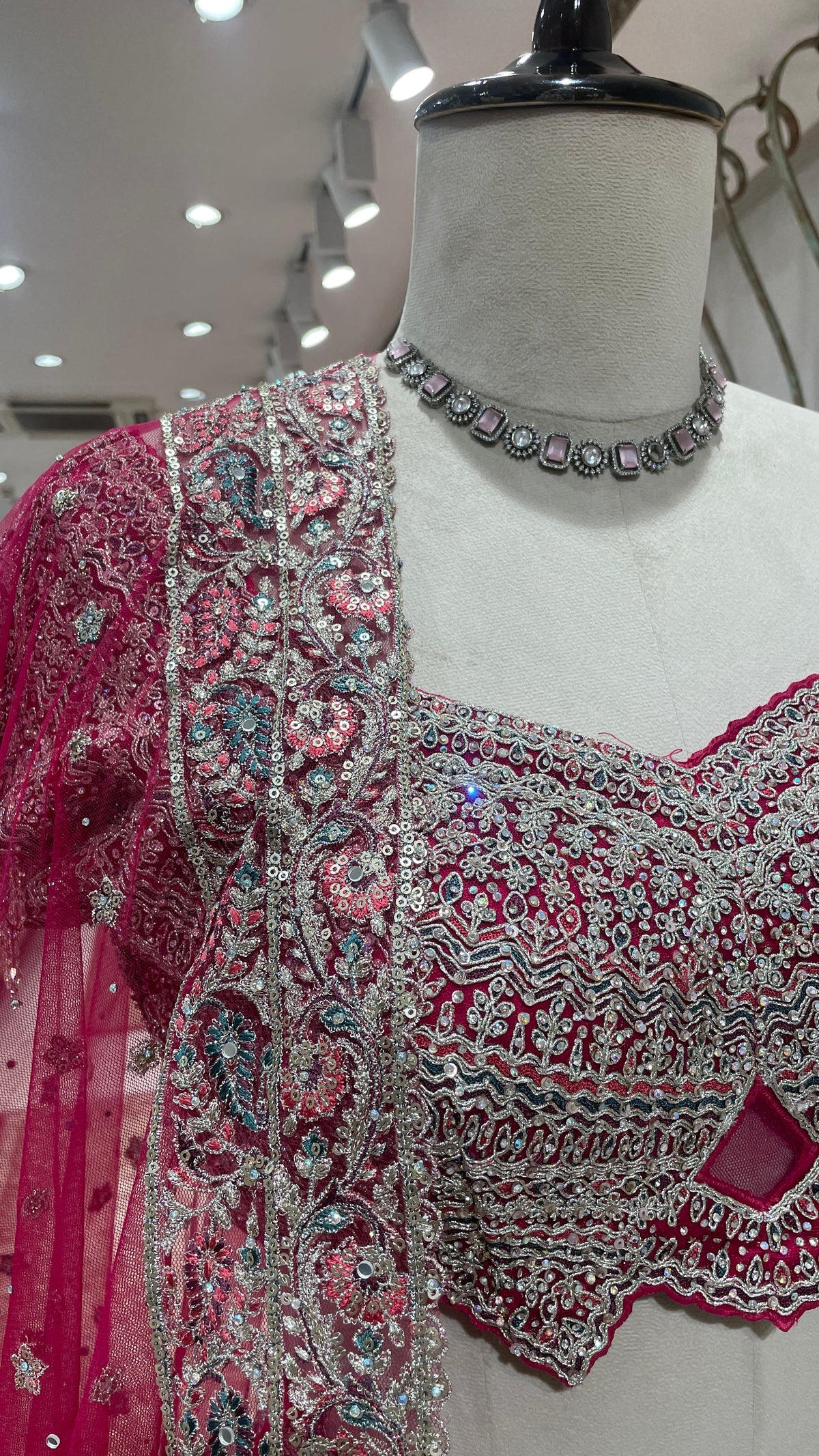 Pink Net Lehenga with Floral Motifs