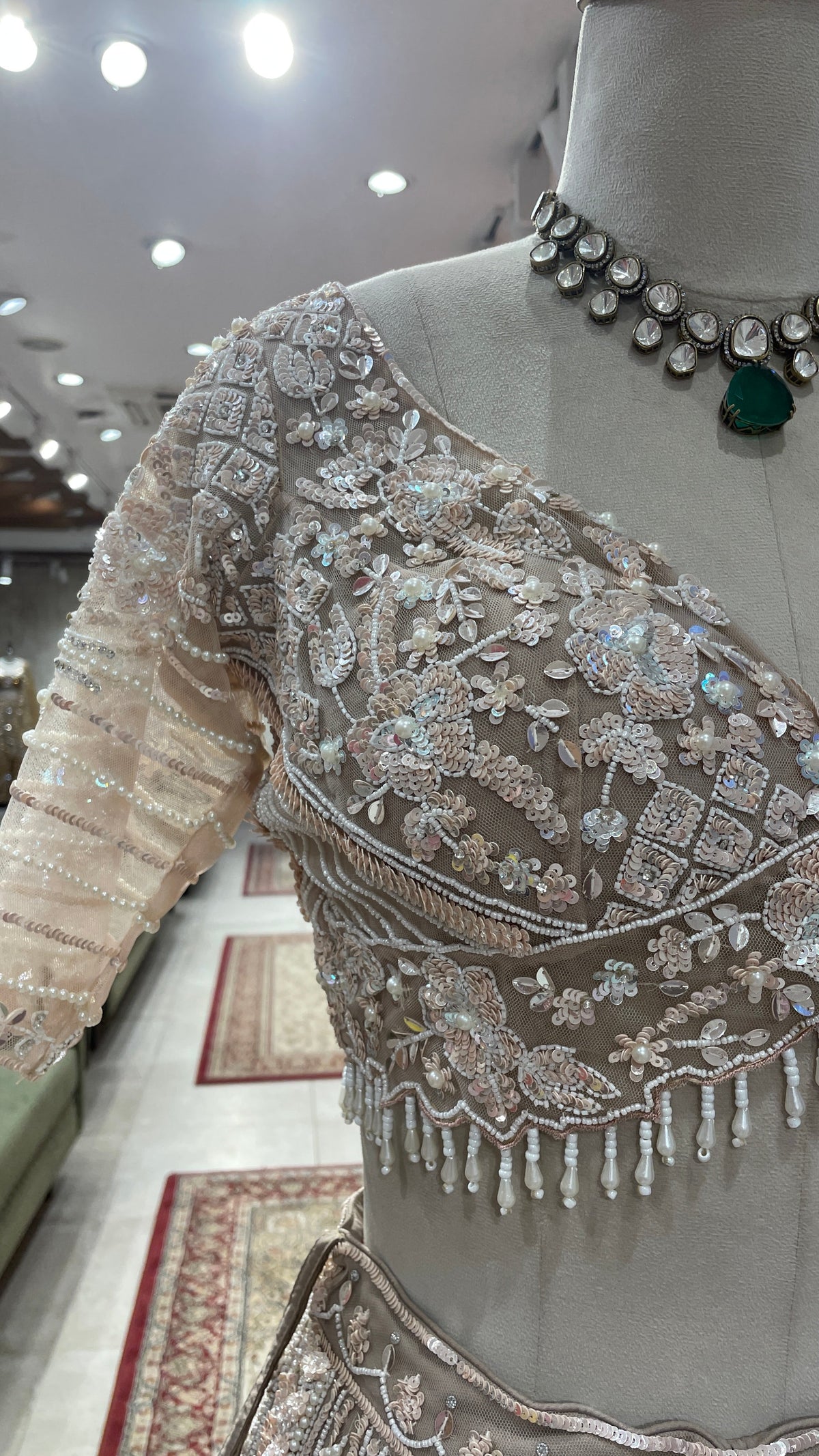 Cream Net Lehenga with Sequins & Cutdana Embellishments