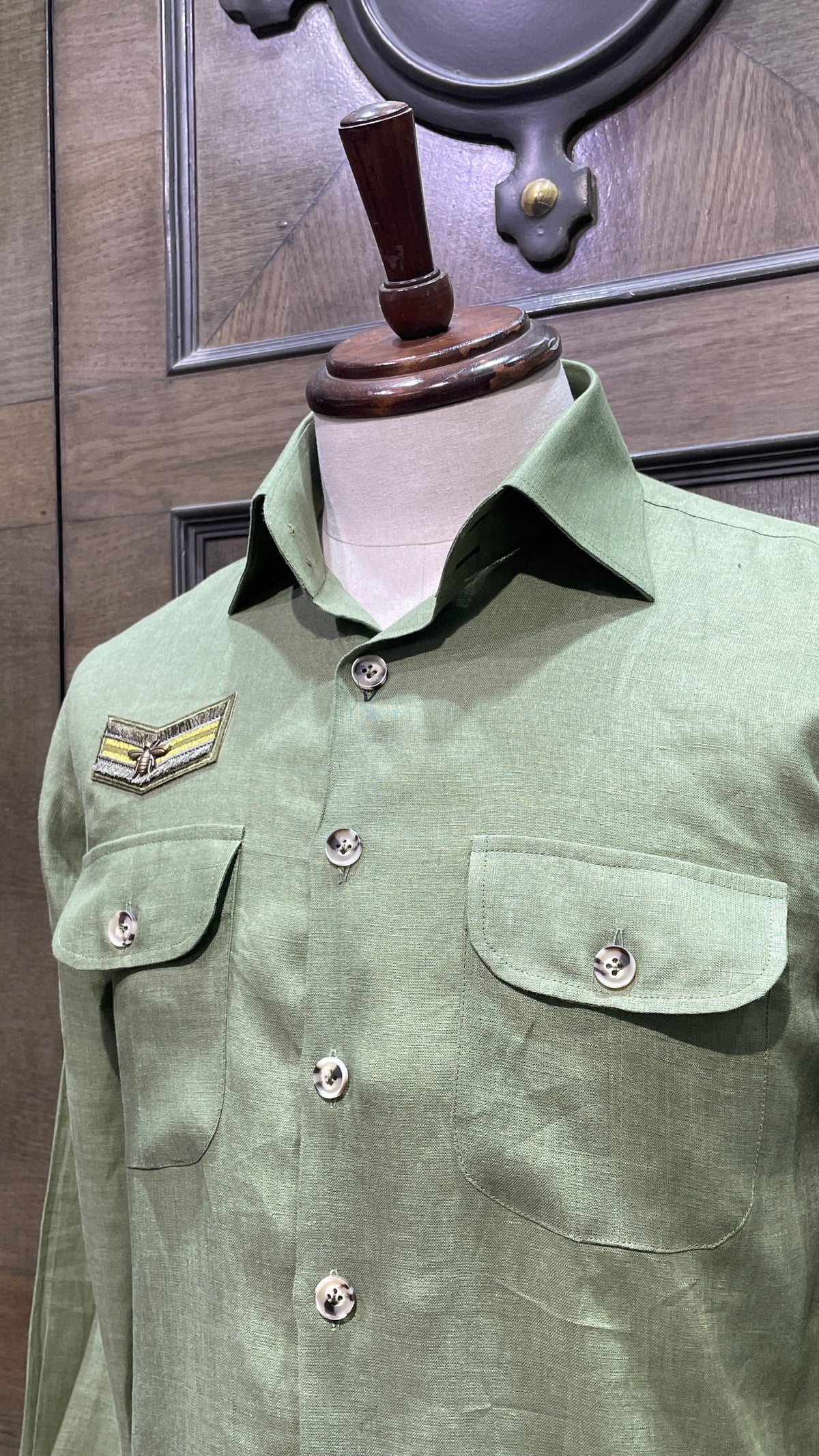 Green linen safari shirt with embroidered badges