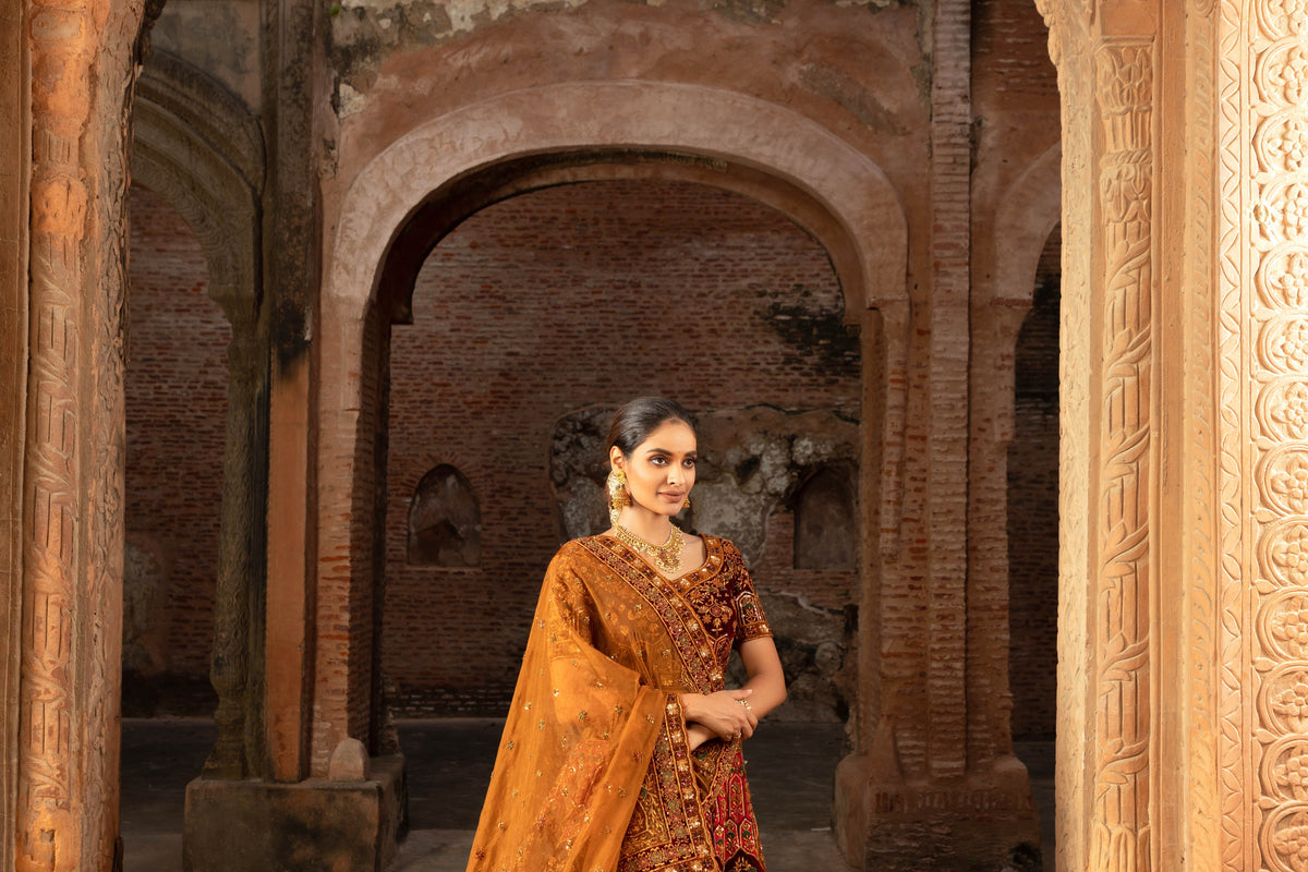 Lustrous Rusted Silk Bridal Lehenga with Sequins and Delicate Floral Motifs