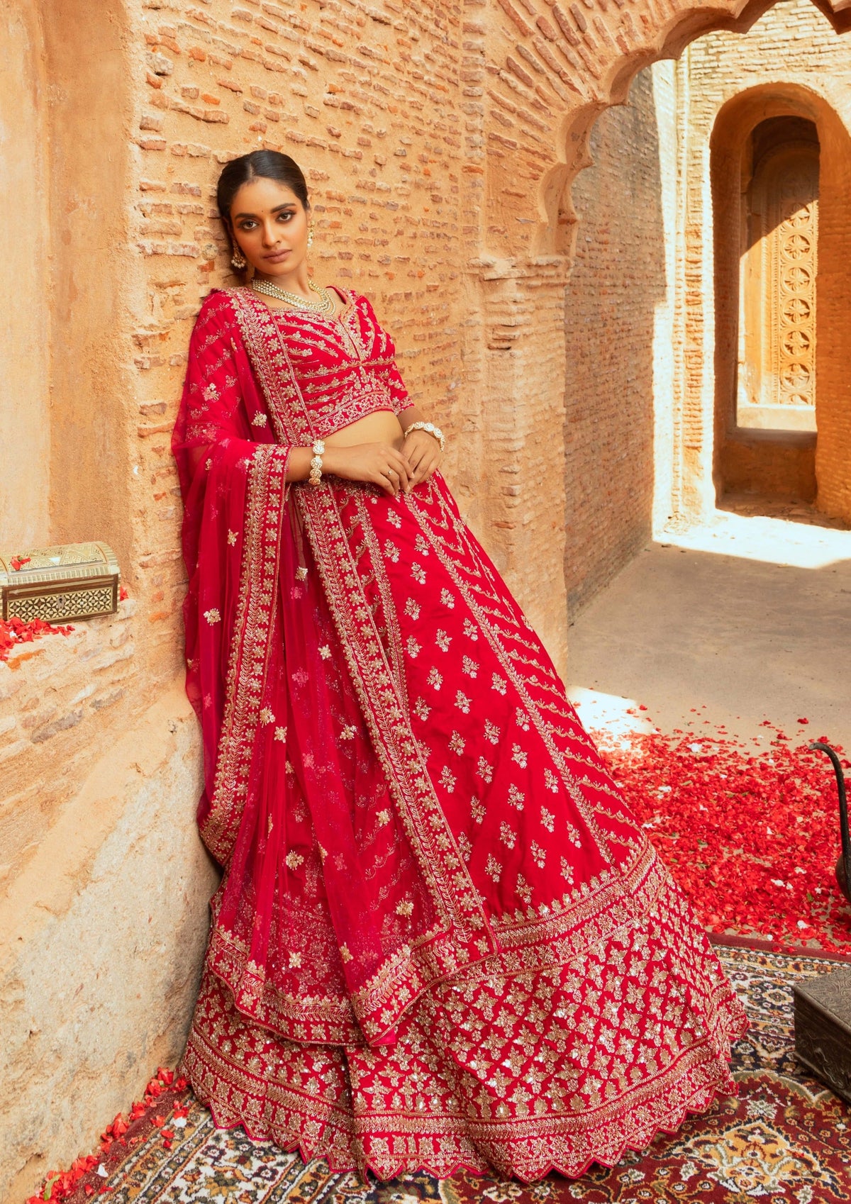 Royal Red Silk Bridal Lehenga with Floral Motifs, Sequins, and Cutdana Embellishments