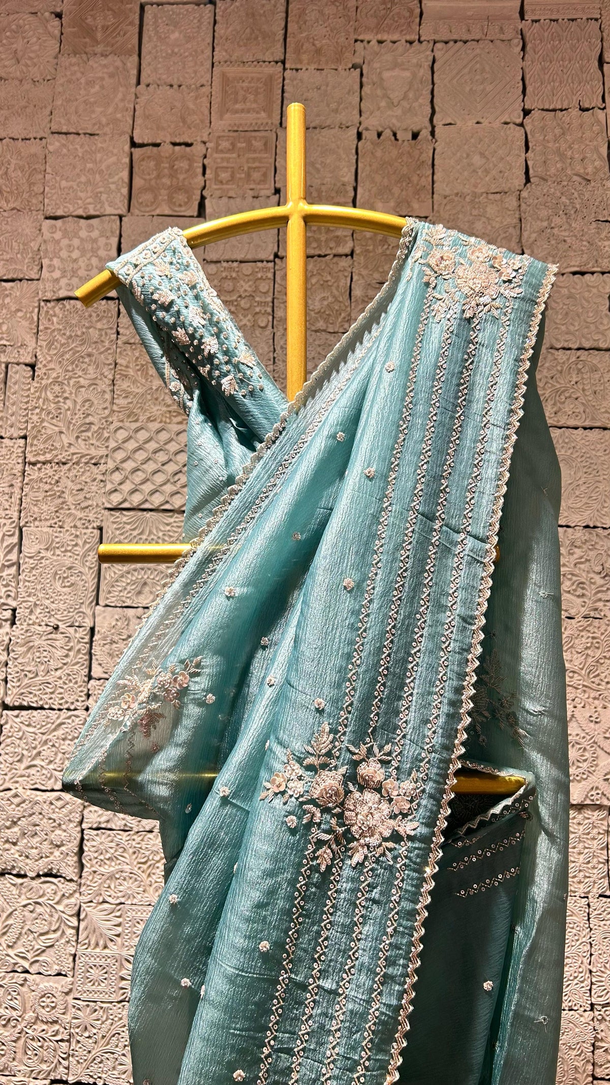 Light blue saree with zig-zag border