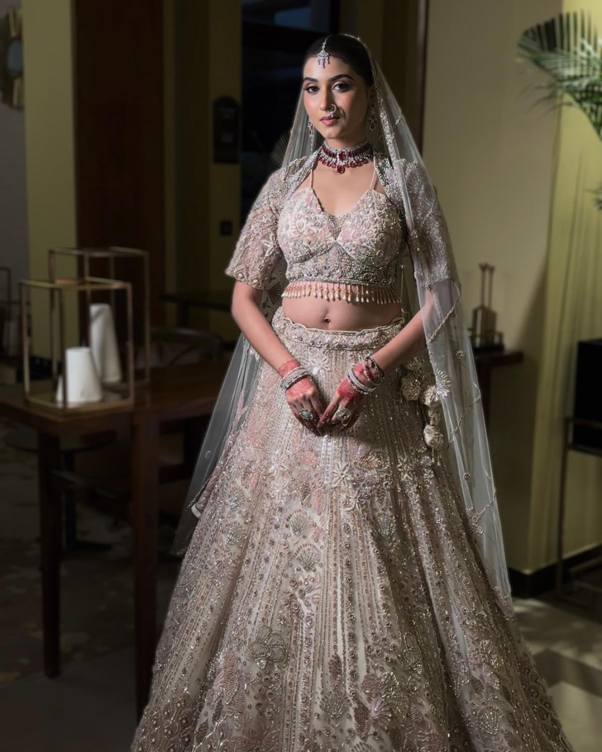 Pink & cream net lehenga with Floral embellishments