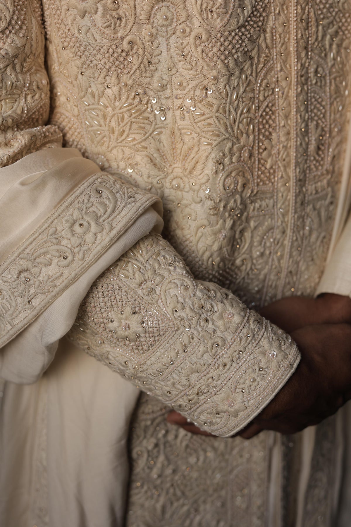 Ivory silk sherwani with intricate embroidery