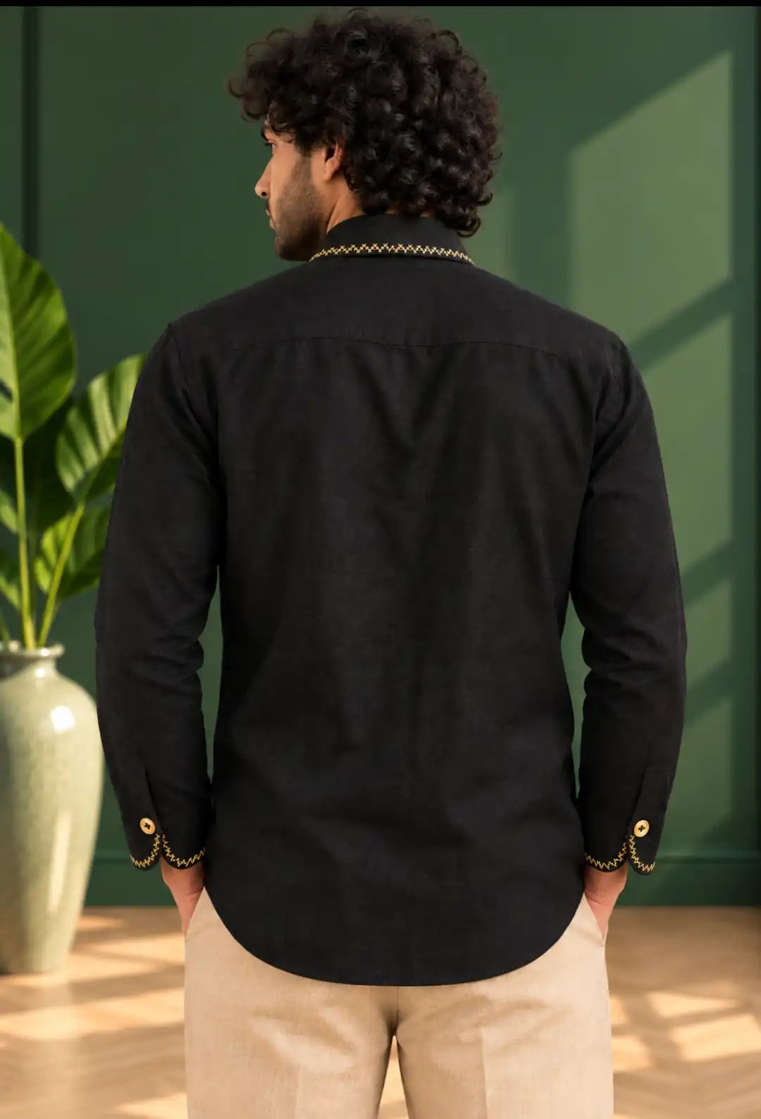 Hand painted black shirt Decorative stitch detailing Shaded buttons Painting motif - horse