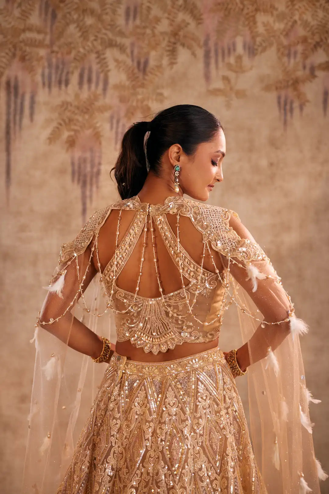 Cream Lehenga with Choker Style Cape and Embroidery
