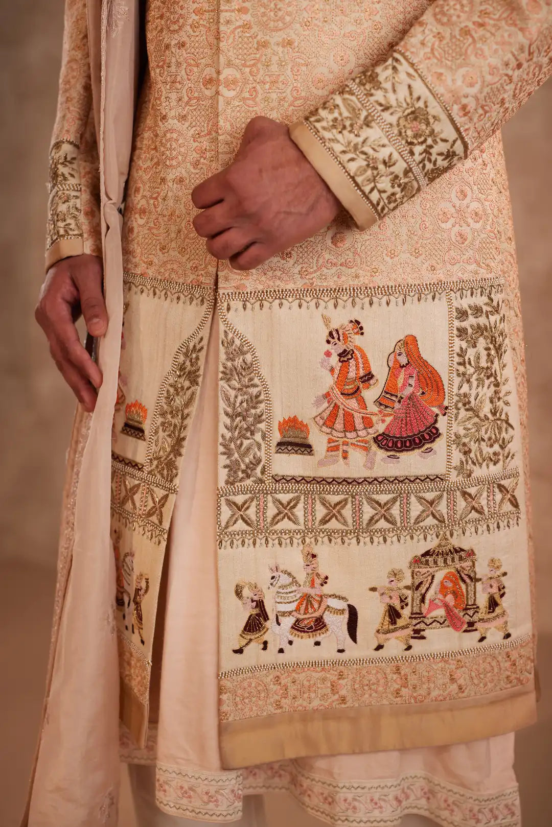 Gold silk Sherwani for groom with intricate hand embroidery
