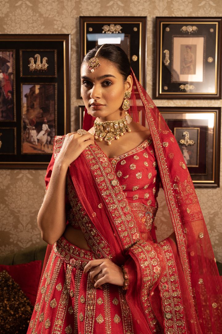 Red Silk Bridal lehenga with paisely Butis
