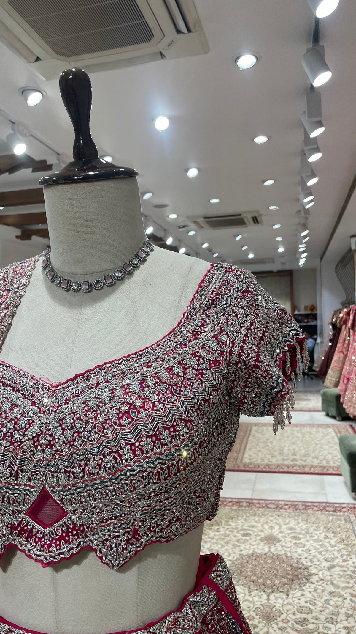 Pink Net Lehenga with Floral Motifs