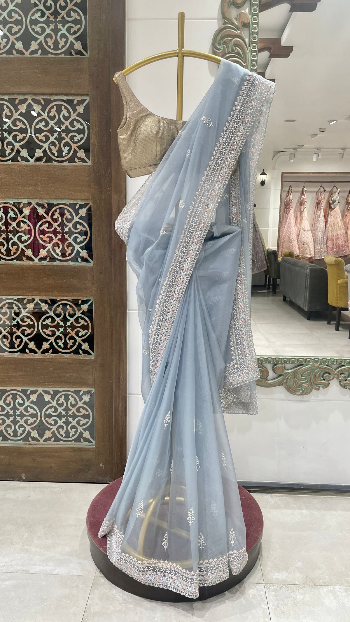 Blue organza saree with sequins and cutdana