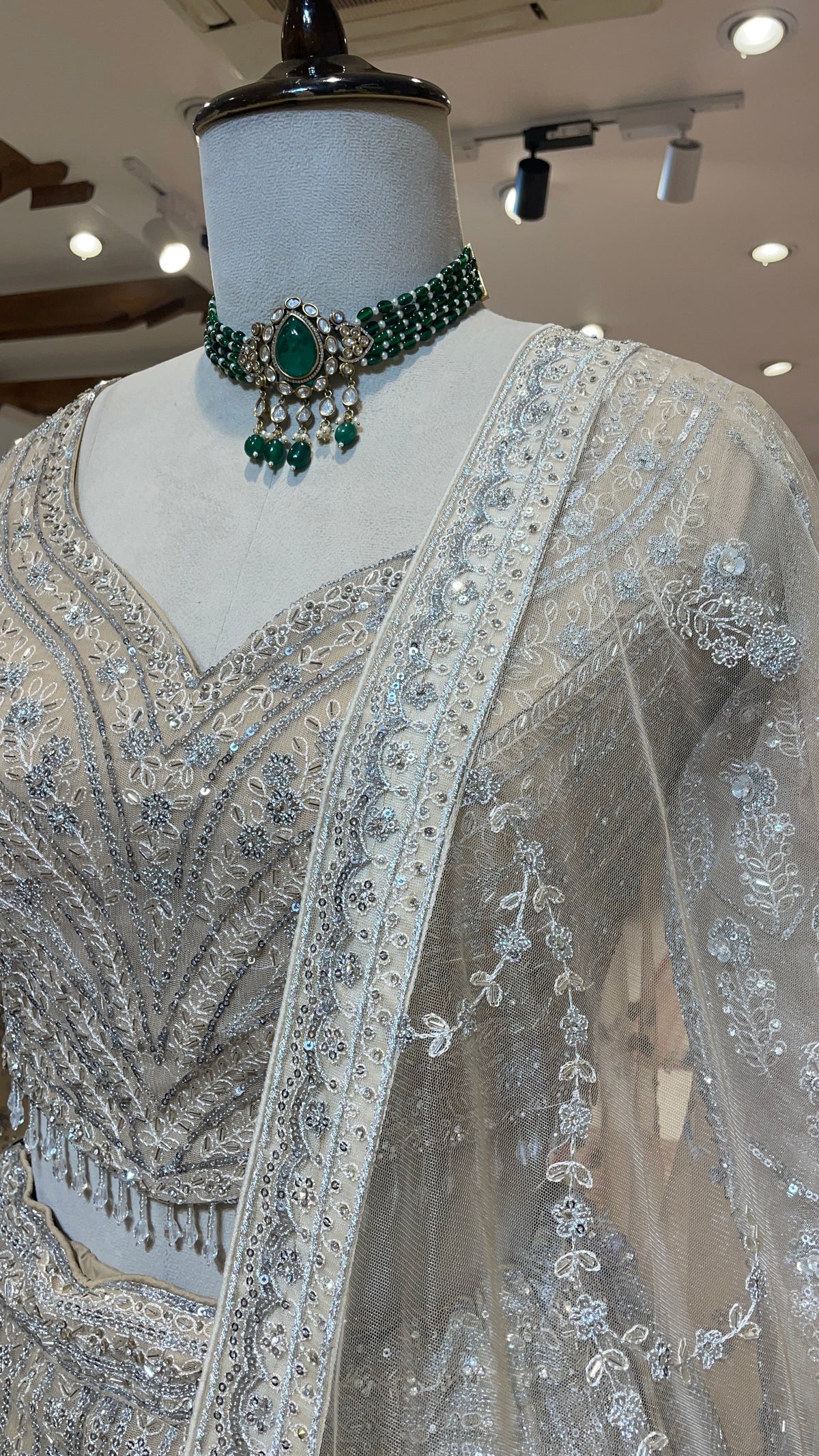 Cream Net Lehenga with Sequin Embellishments