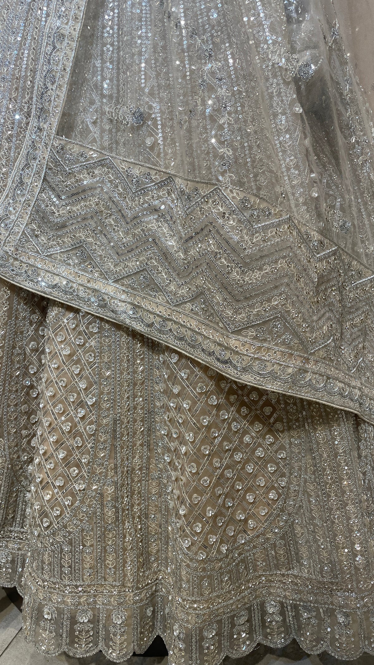 Cream Net Lehenga with Sequin Embellishments