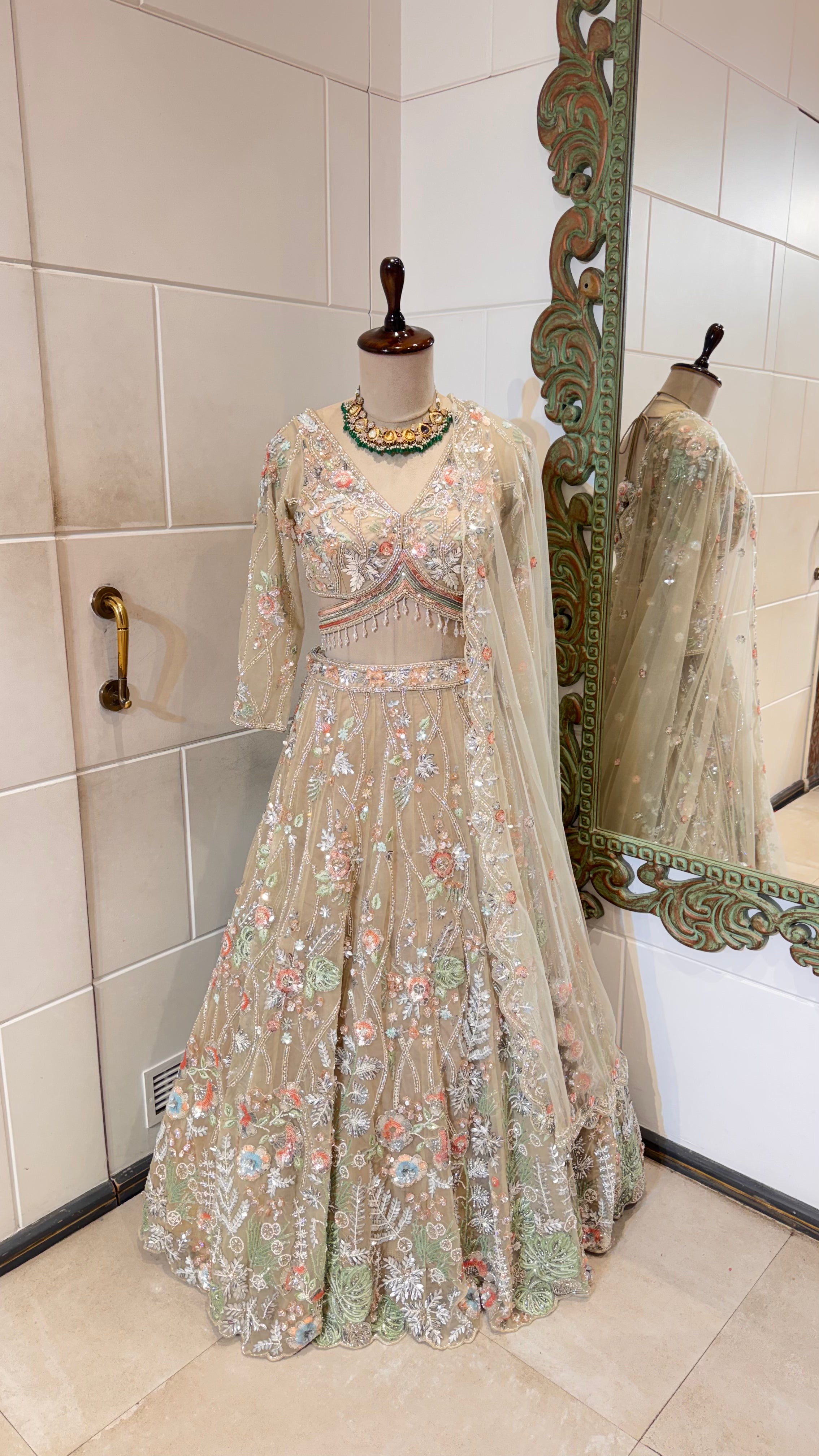 Gold lehenga with multicolor embroidery