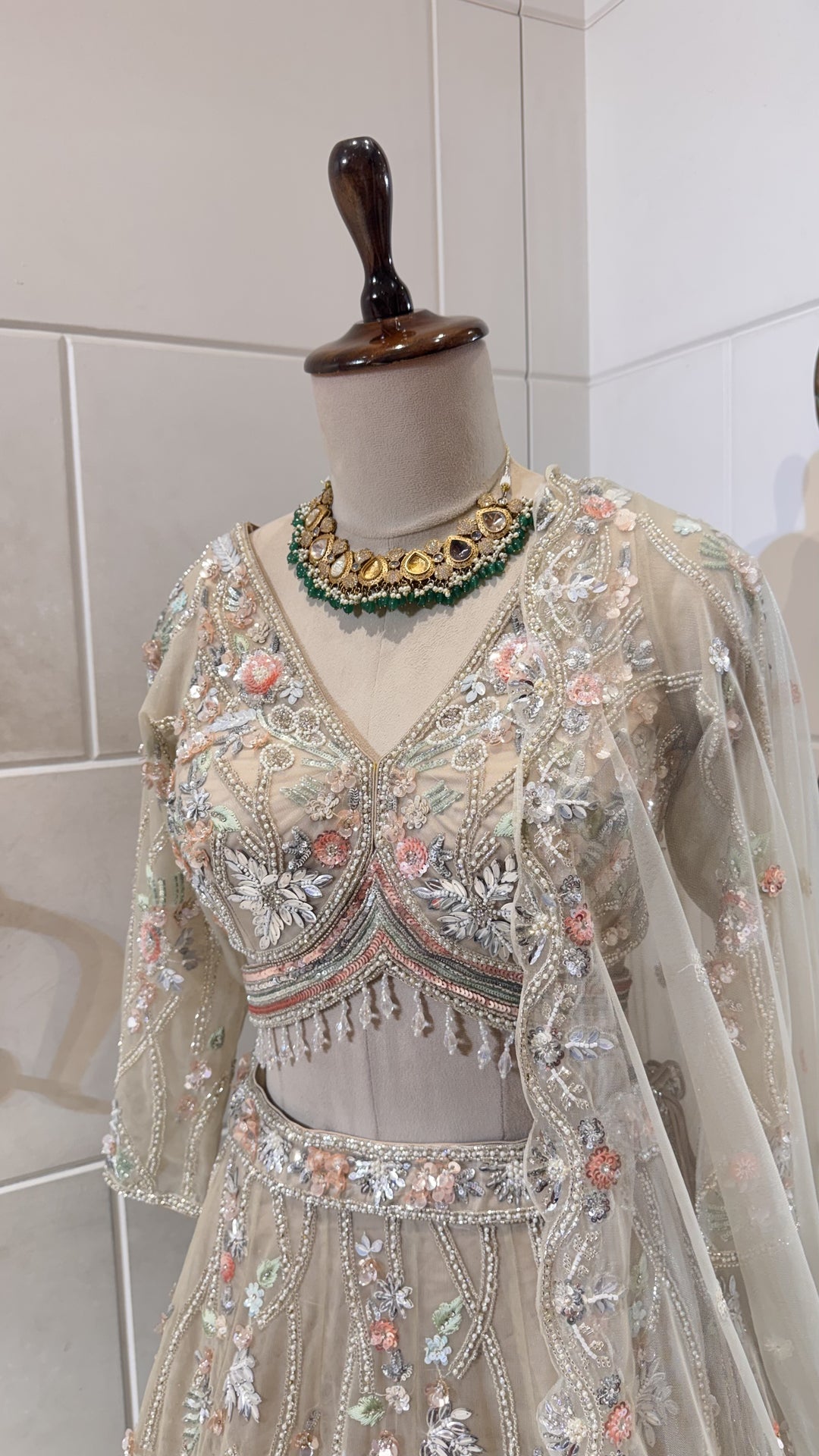 Gold lehenga with multicolor embroidery